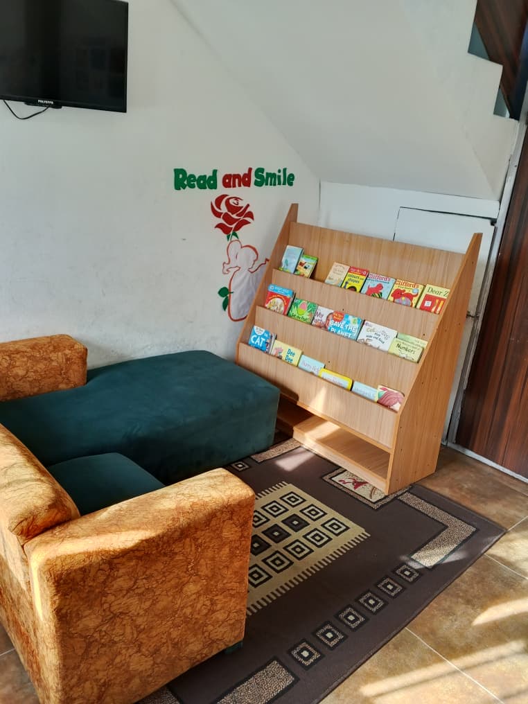 The peaceful reading corner with curated books and soft lighting